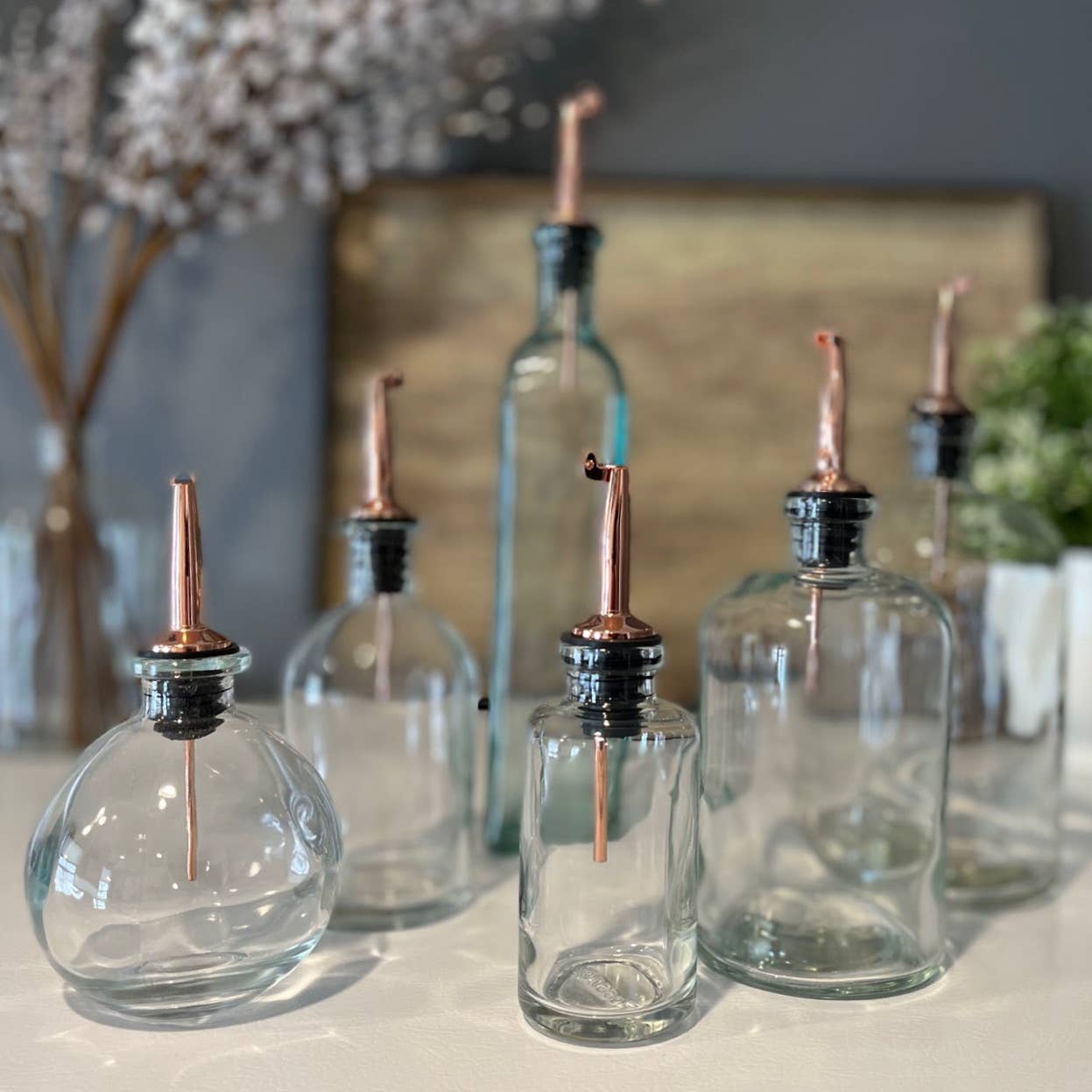 Apothecary Clear Glass Bottle with Weighted Pour Spout: Gold Rubber
